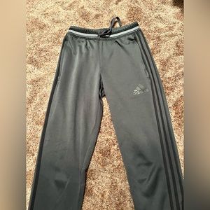 grey and black adidas pants